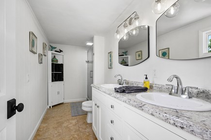 Mashpee Cape Cod vacation rental - Upstairs bathroom with a double vanity and walk in shower