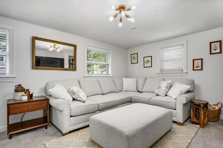Mashpee Cape Cod vacation rental - Gather for movie night on the sectional couch