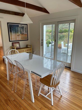 Truro Cape Cod vacation rental - Light-filled dining room with windows to garden on three sides