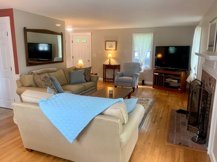 Falmouth, New Silver Beach Cape Cod vacation rental - Expansive FR includes extra seating  beyond couch & patio access.