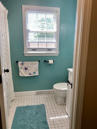 Falmouth, New Silver Beach Cape Cod vacation rental - Updated upstairs bathroom with tub & large 1/2 bath on 1st floor.