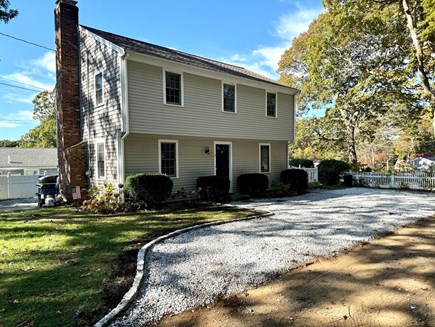 Falmouth, New Silver Beach Cape Cod vacation rental - Home with new driveway for plenty of parking, 3/4 fenced-in yard.