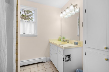 Harwich Port Cape Cod vacation rental - Second floor bathroom with shower/tub combo