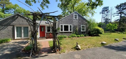 Wellfleet Cape Cod vacation rental - Side entrance and parking space.
