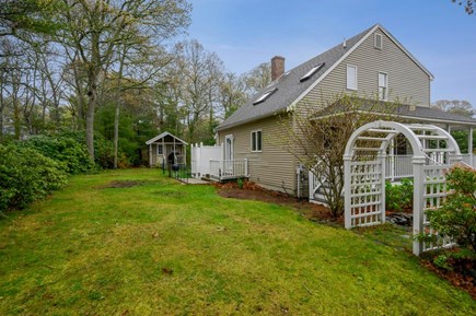 Orleans Cape Cod vacation rental - Backyard now with a doggy area alongside back of house