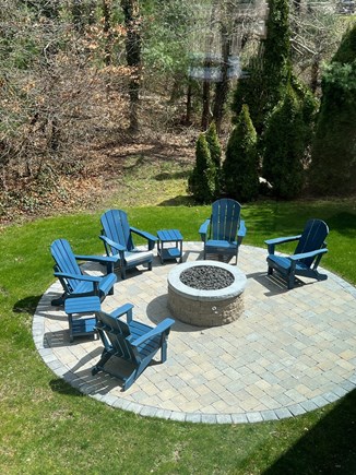 Orleans Cape Cod vacation rental - Gas lined fire pit with 7 all adirondack chairs and 2 tables