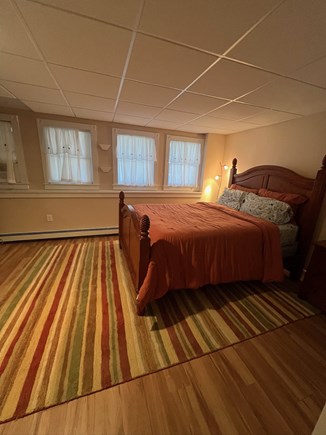Orleans Cape Cod vacation rental - Downstairs queen bedroom with storage and A/C unit