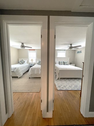 South Dennis Cape Cod vacation rental - Hallway view into bedrooms