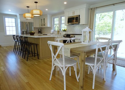 Dennis Port Cape Cod vacation rental - Lovely spacious dining area and kitchen, slider to patio