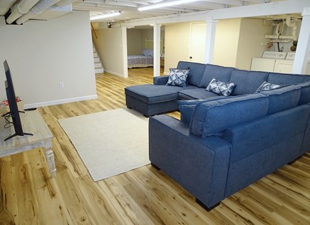 Dennis Port Cape Cod vacation rental - Lower living room w/ Smart TV, washer/dryer, bonus queen bedroom