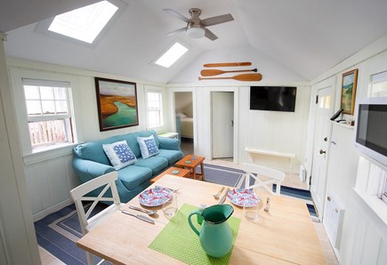 Yarmouth Cape Cod vacation rental - Dining indoors or watching a movie in open space.