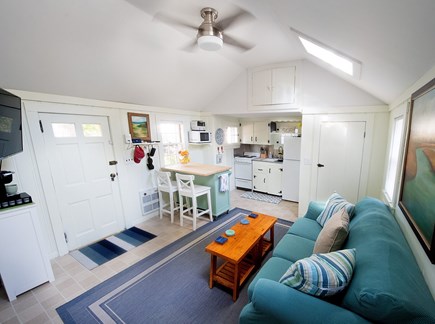 Yarmouth Cape Cod vacation rental - Dining indoors or watching a movie in open space.