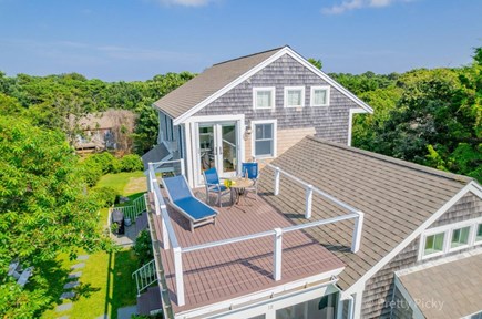 Eastham Cape Cod vacation rental - Relax and recharge on balcony deck from primary bedroom.