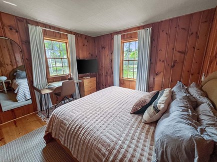 Dennis Port Cape Cod vacation rental - Large King sized bed, flat screen TV and remote work space create the perfect primary bedroom
