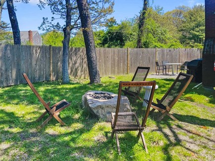 Dennis Port Cape Cod vacation rental - Numerous outdoor spaces to enjoy including this gas fireplace and surrounding seating