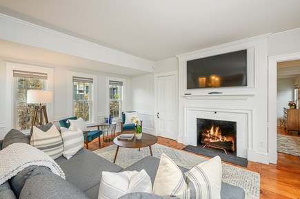 Harwich Port Cape Cod vacation rental - Living room with fireplace and TV