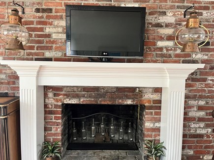 Dennis Cape Cod vacation rental - Living room fireplace and TV