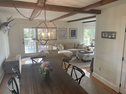 Chatham Cape Cod vacation rental - Dining area looking out to 2 sliders to large outdoor deck.
