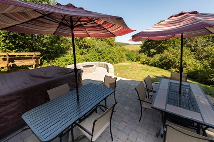 South Plymouth MA vacation rental - Patio with tables and umbrellas, hot tub