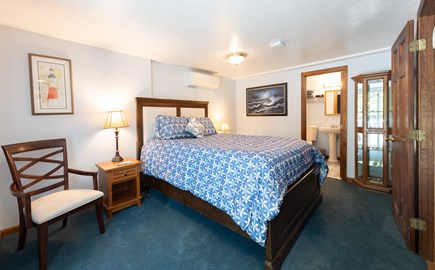 South Plymouth MA vacation rental - Ground level suite with bathroom, sliders to ground deck