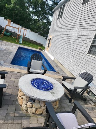 Mashpee Manor Pool House Cape Cod vacation rental - Heated pool with a gas fireplace!