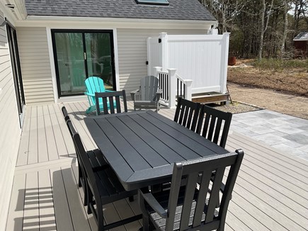 Brewster Cape Cod vacation rental - Back deck ,with Adirondack  chairs two, and large out side shower