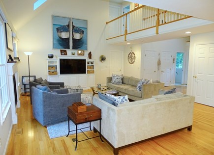 Between Falmouth &Woods Hole Cape Cod vacation rental - Living room with vaulted ceilings, TV