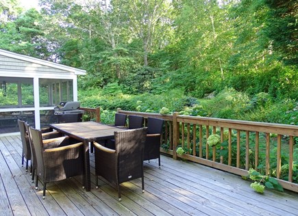 Between Falmouth &Woods Hole Cape Cod vacation rental - Large back deck with dining & grill overlooking lush,private yard