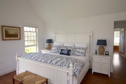 Brewster Cape Cod vacation rental - Upstairs primary bedroom with king bed and en suite bath.