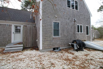 20 Abagail St, Wellfleet Cape Cod vacation rental - Back door/outdoor shower. grill/ out dining