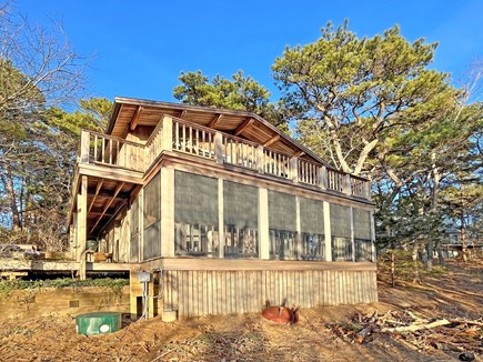 Wellfleet Cape Cod vacation rental - Exterior view of rear of house, fire pit available in yard