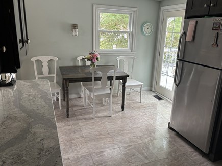 Mashpee Cape Cod vacation rental - Well equipped kitchen with lobster pots and outdoor grill.