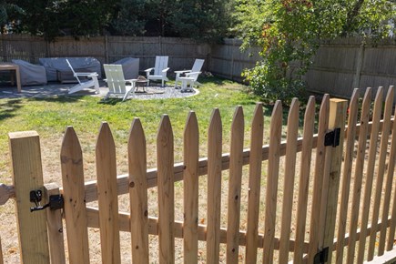 West Yarmouth, Lewis Bay Cape Cod vacation rental - Backyard firepit and seating area