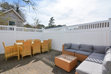 Dennis Port Cape Cod vacation rental - Back patio, dining for 8, sectional seating