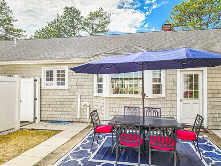 Yarmouth Cape Cod vacation rental - The back yard has a new patio, seating for 6, a grill & shower