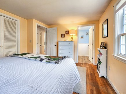 Yarmouth Cape Cod vacation rental - Primary bedroom with en suite half bathroom.