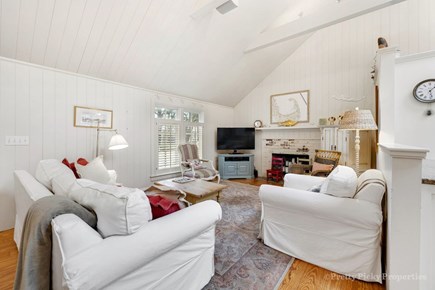 Brewster Cape Cod vacation rental - Living room with lounge seating and big TV
