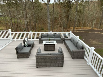 Barnstable  Cape Cod vacation rental - Deck seating area with a gas fireplace!