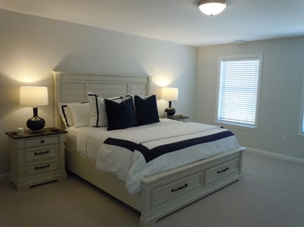 Barnstable  Cape Cod vacation rental - Master bedroom with a walk in closet and private bath & lg TV.