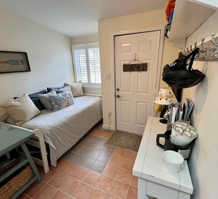 Osterville Cape Cod vacation rental - Two Bedroom unit: Sunroom with single bed and door to patio