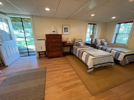 North Falmouth Cape Cod vacation rental - Lower level twin beds and direct access to the yard
