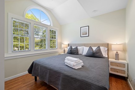 Hyannis Cape Cod vacation rental - In-law suit bedroom with king bed and full-sized desk