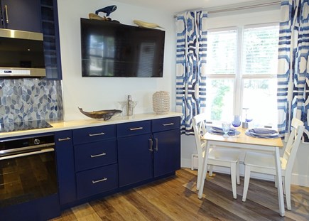 Provincetown West End Cape Cod vacation rental - Kitchen offers dining area, TV