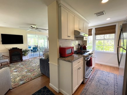Harwich Cape Cod vacation rental - Living room opens to the porch and kitchen