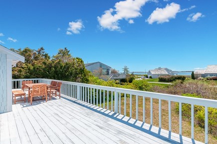 West Yarmouth Cape Cod vacation rental - Outdoor dining on large deck overlooking Lewis Bay