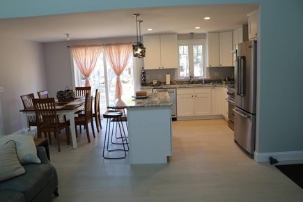 Eastham Cape Cod vacation rental - Kitchen and Dining area with 1/2 cathedral ceiling