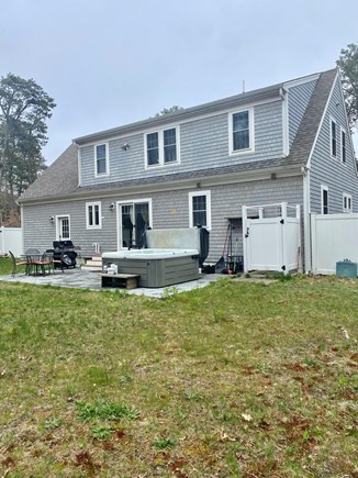 Eastham Cape Cod vacation rental - Spacious back yard, relax in the Jacuzzi