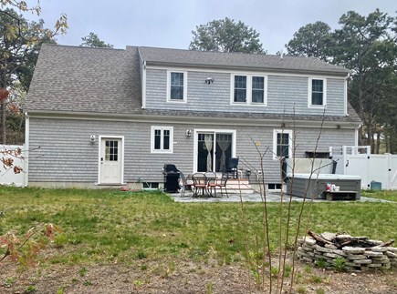 Eastham Cape Cod vacation rental - Enjoy your time in the back yard, gas grill, jacuzzi, and firepit