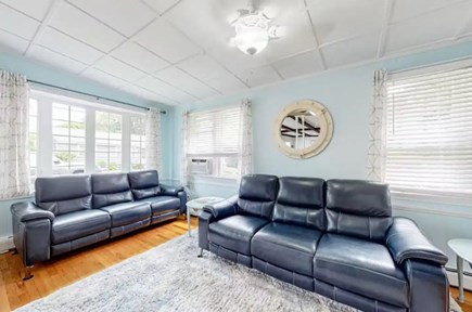 South Yarmouth Cape Cod vacation rental - Sunken Living Room Barn Door Closure Smart TV & Fireplace