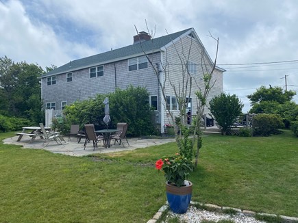 East Falmouth Cape Cod vacation rental - Exterior: Large Backyard, Stone Patio, Outdoor Shower, Side Deck